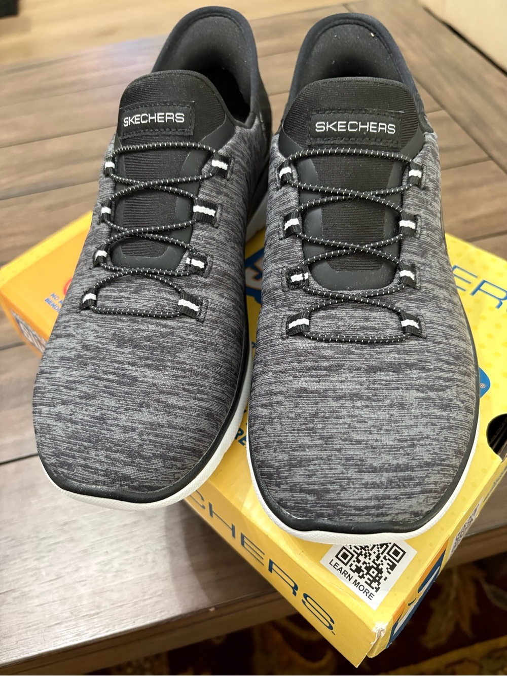 Skechers Women's Heathered Charcoal Gray Slip-On Knit Sneakers